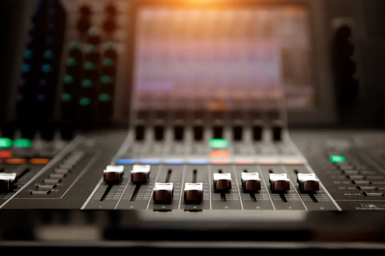 Channel faders on a professional audio mixing console