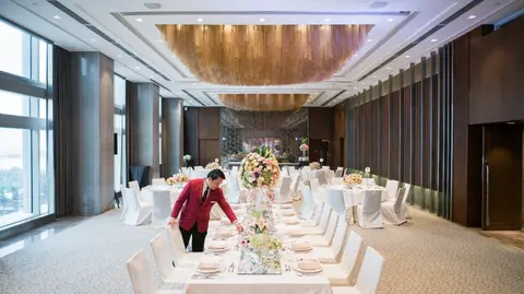 Banquet set-up beneath a timber feature ceiling in the renovated Marco Polo Ortigas ballroom
