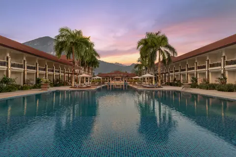 Courtyard pool between guest wings at sunset, Four Points Palawan