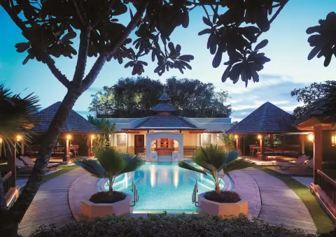 Garden pool and pavilion at Shangri-La Mactan resort in the evening